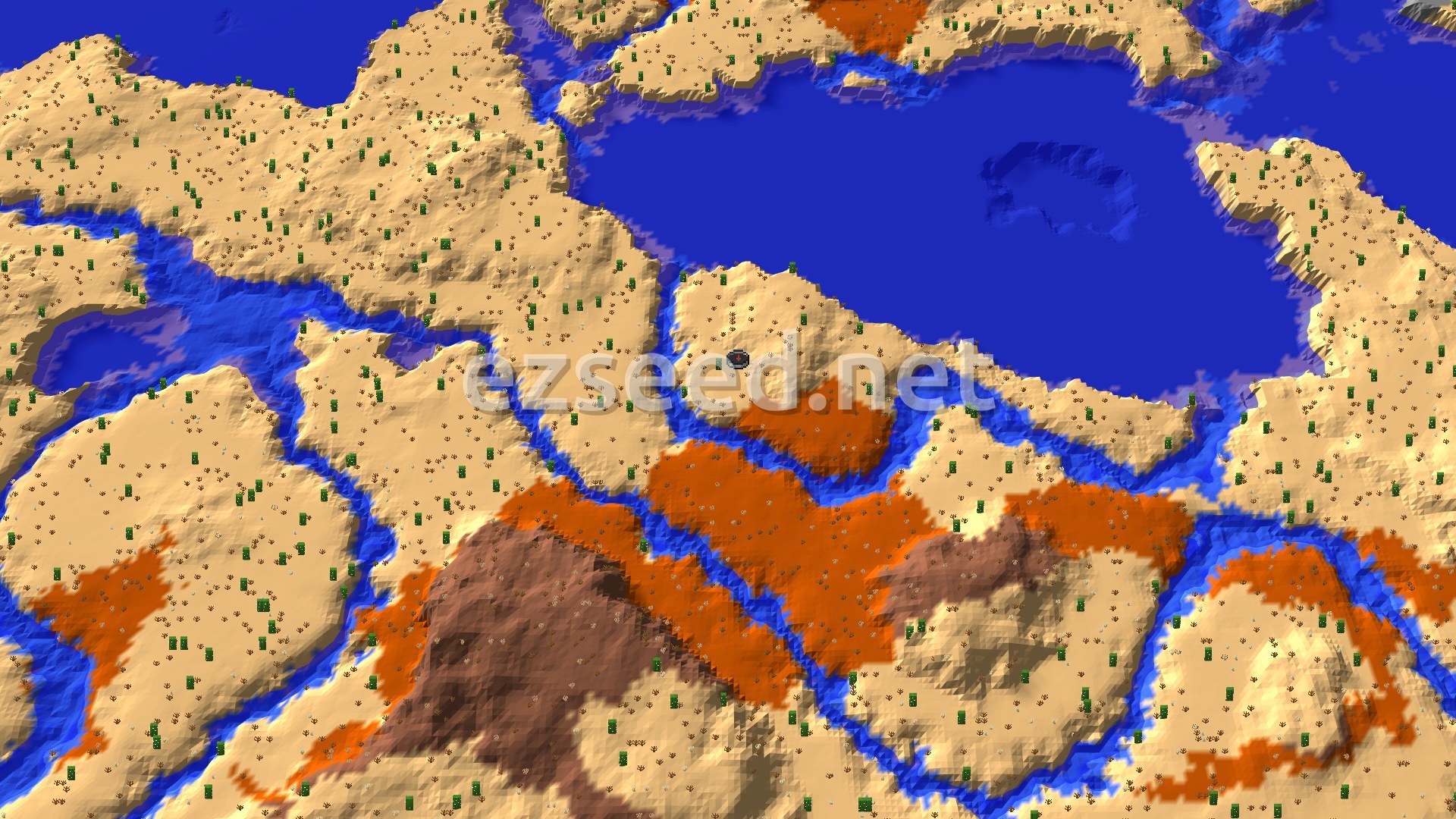 An aerial view of a desert landscape featuring sandy hills, a prominent body of warm ocean water, and winding rivers. Patches of badlands biome are visible, along with scattered cactuses and small bushes. A spawn marker is at the center.