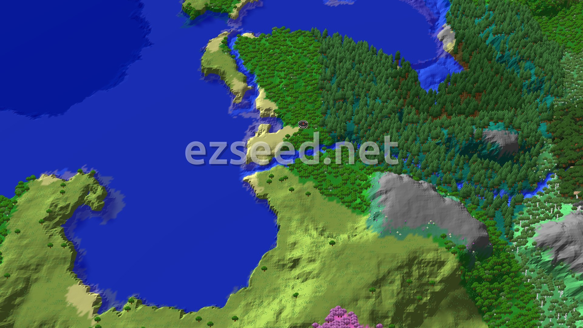 An aerial view of a forested coastline with a small spawn marker. The terrain features dense green forests, light sandy beaches, and blue ocean. Some grey hills are visible in the distance.