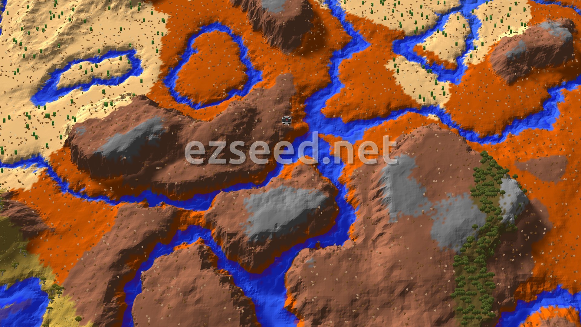 An aerial view shows a winding blue river cutting through a landscape of orange Badlands, some areas of lighter desert, and patches of grey stone mountains, with sparse green vegetation.