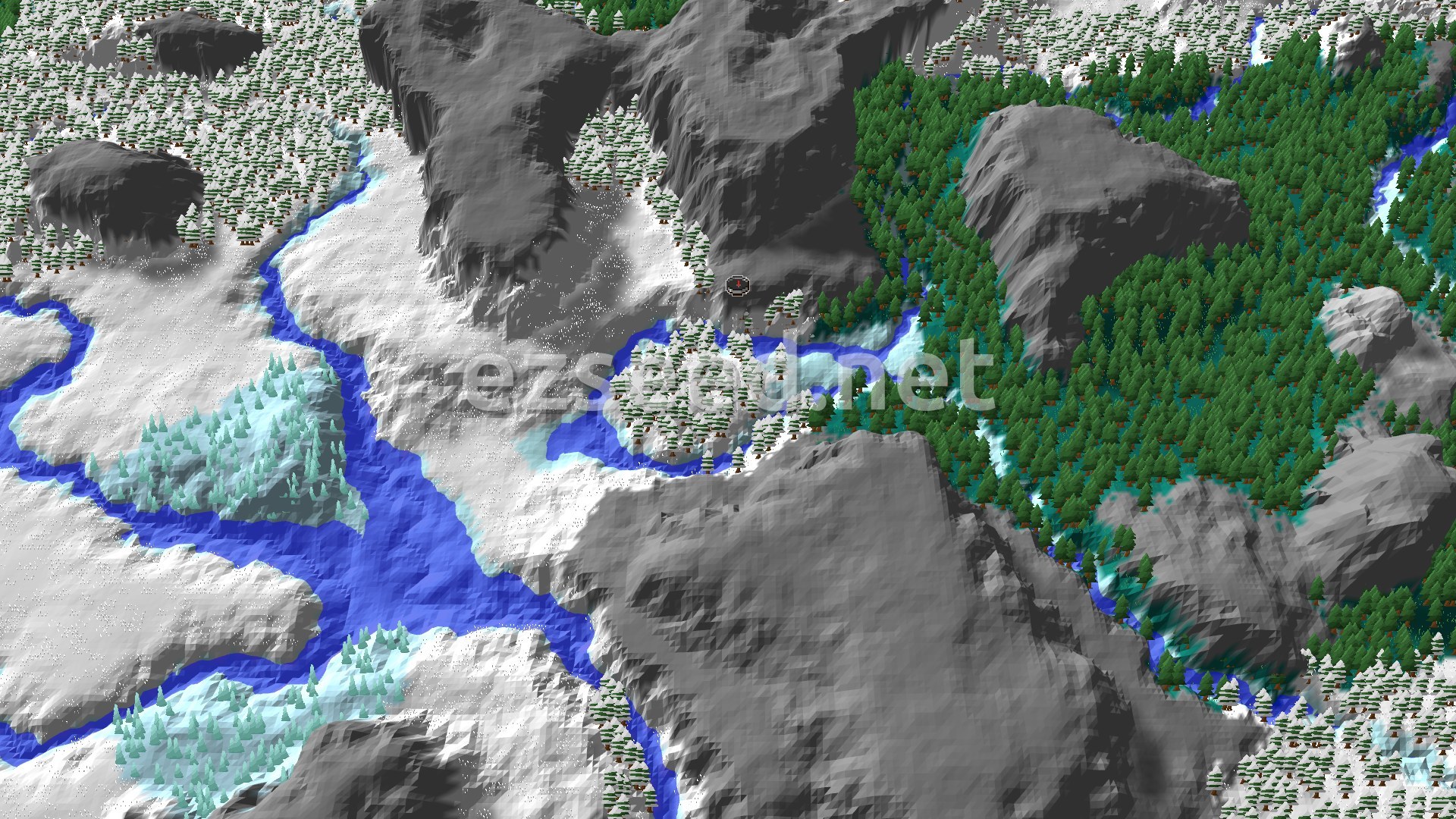 An aerial view of a snowy landscape with a mix of pine forests and bare mountains, intersected by a frozen river, with a small spawn marker in the center of the image.