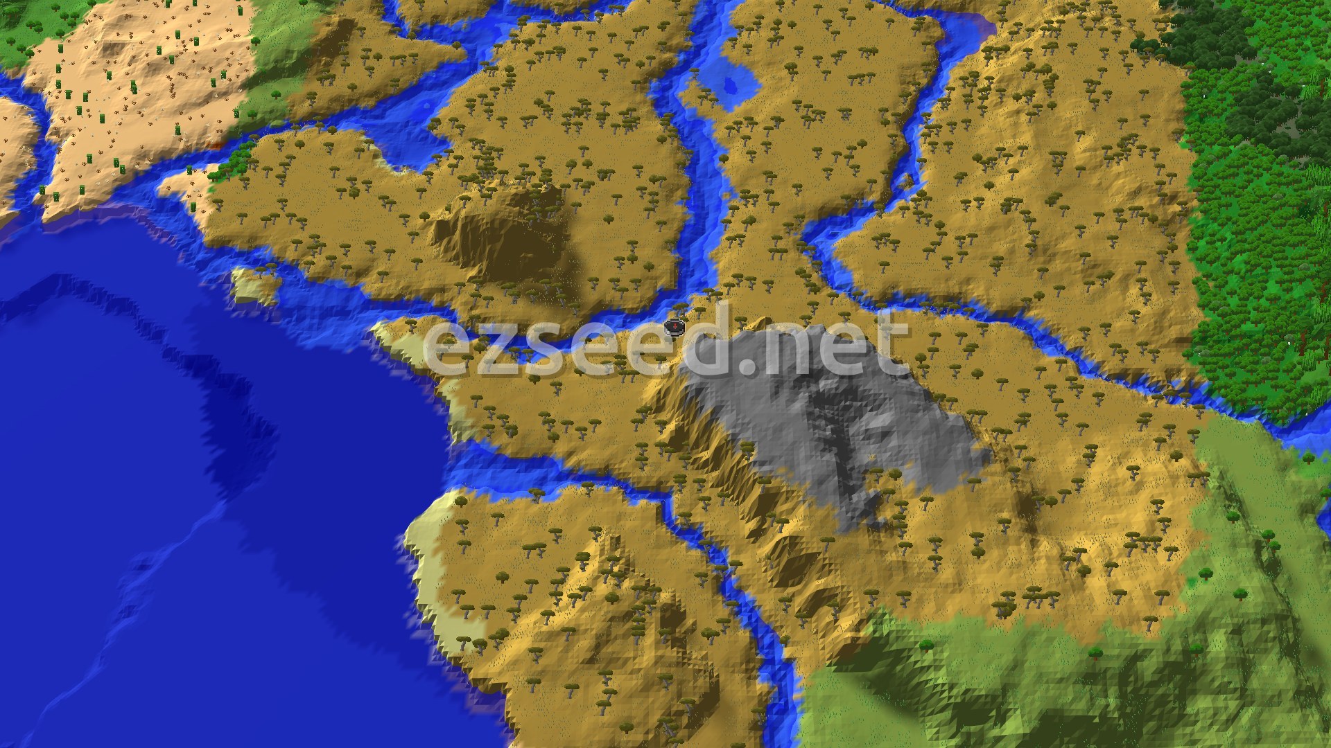 An aerial view of the spawn area, showing rolling savanna hills dotted with acacia trees, bordered by a large body of water to the west and a dense forest to the east. A grey, stony peak rises in the south-central part of the image, with rivers winding through the landscape.