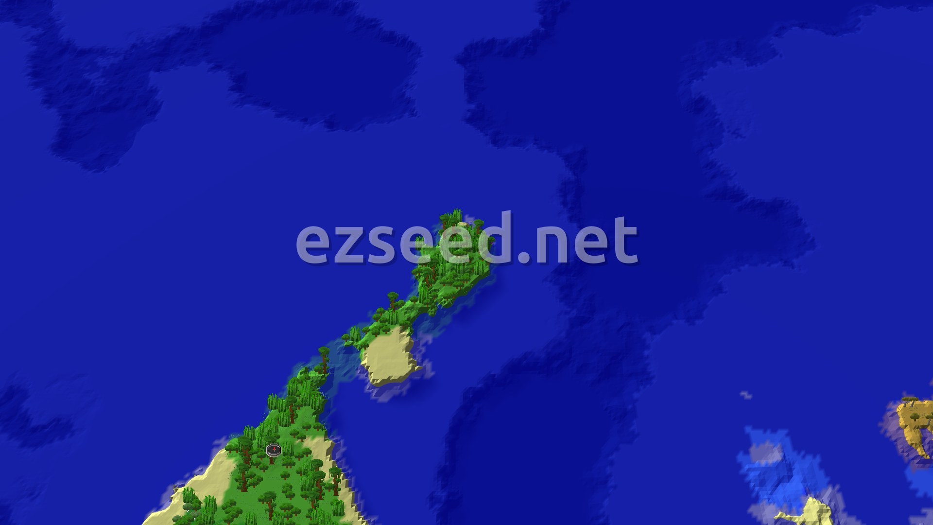 An aerial view of a long, narrow jungle island surrounded by deep blue ocean, with a small spawn marker near one end.